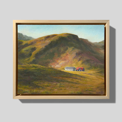 Kvöldsól yfir Sveinshúsi